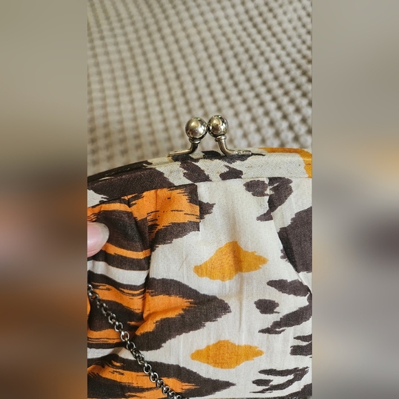 K.C.MALHAN Ikat Printed Woven Cloth Dumpling Chain Bag In Orange/brown Multi. - Picture 2 of 11